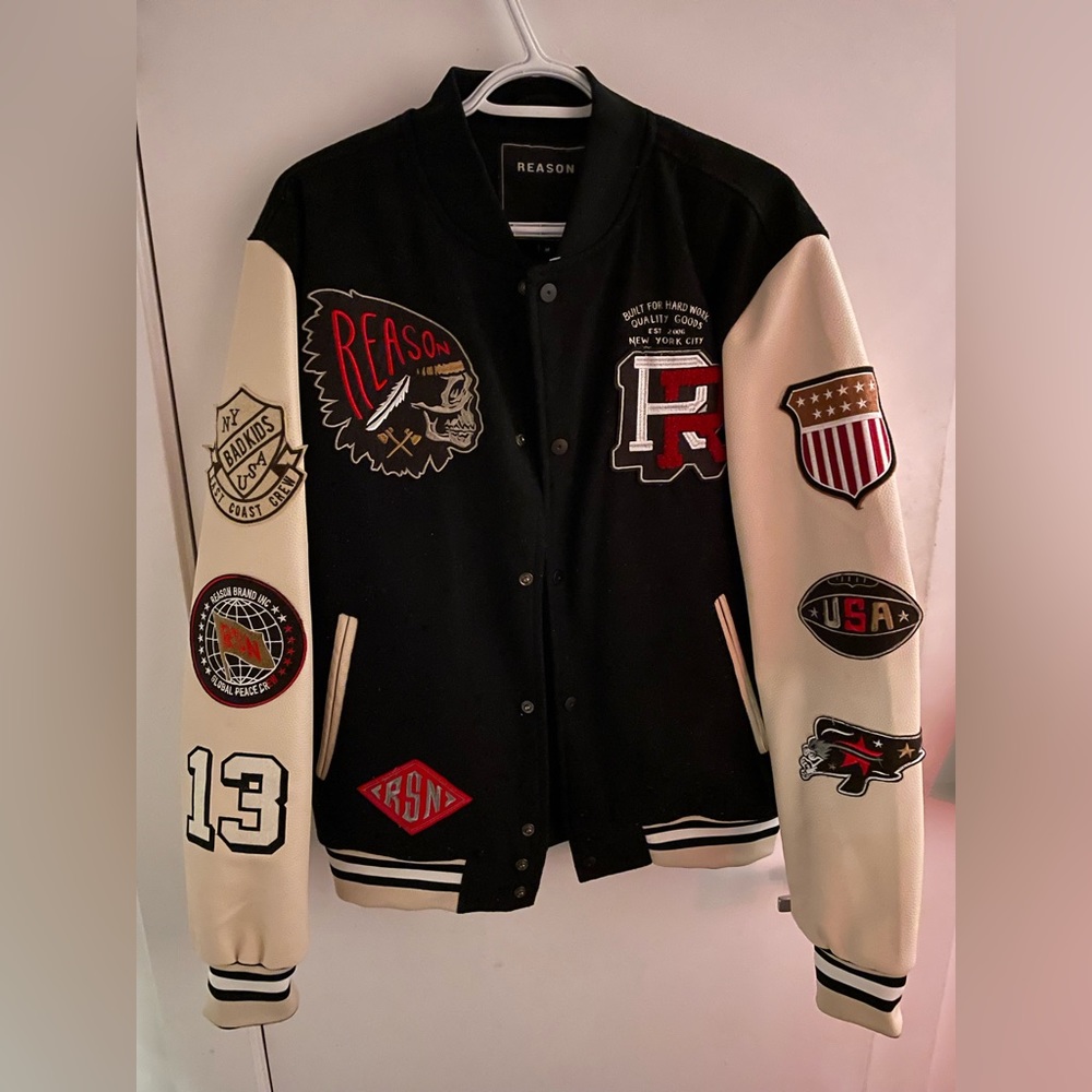 Jacket size is M. Warm and stylish. Brand is is called Reason.
